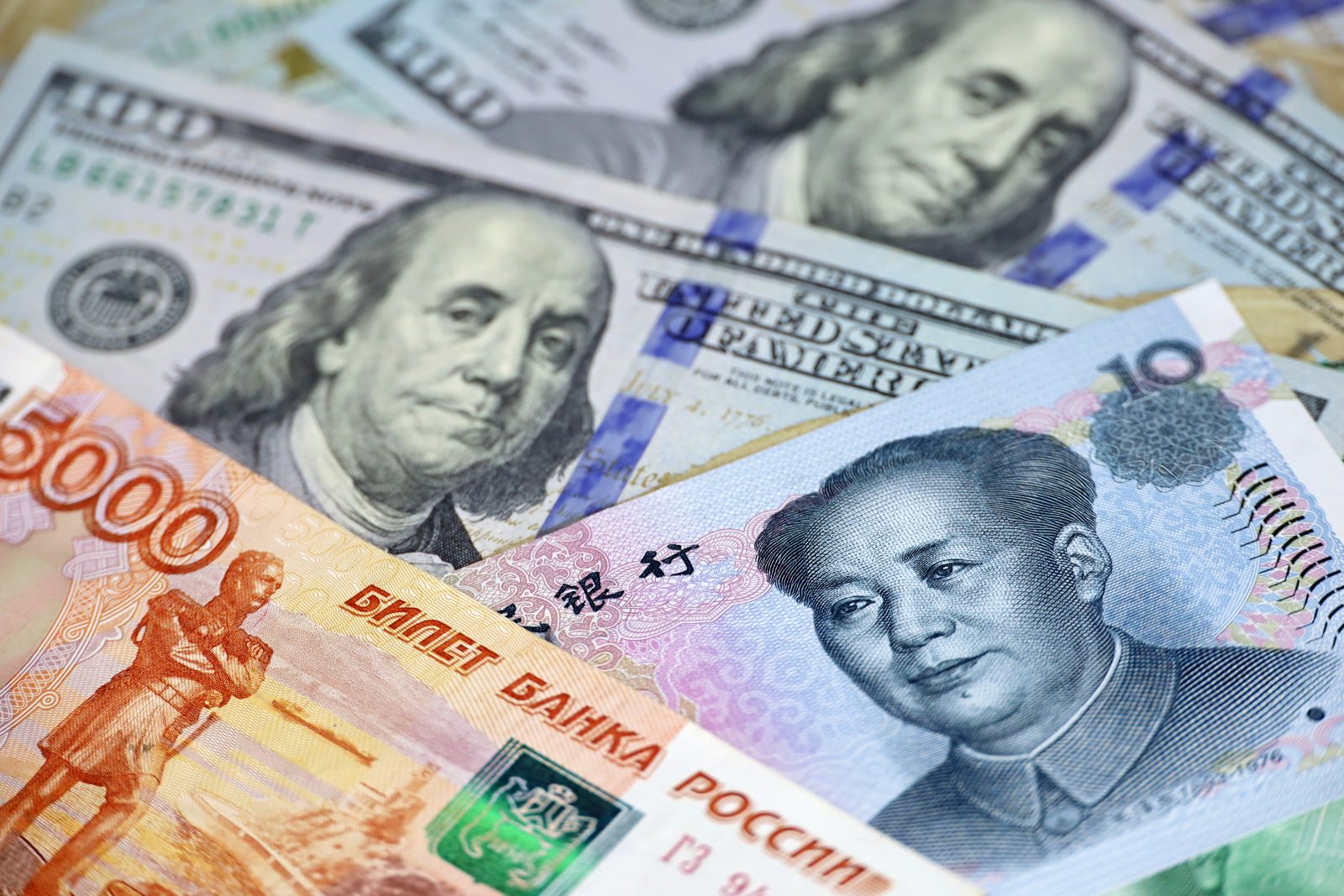 Chinese,Yuan,,Russian,Rubles,And,Us,Dollars,Banknotes.,Concept,Of