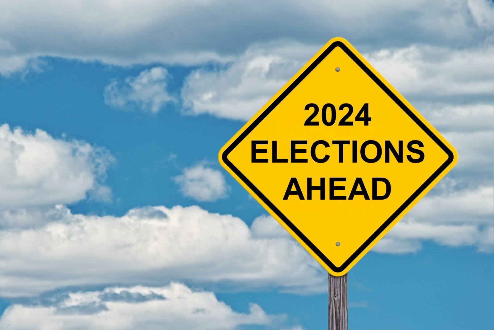 2024,Elections,Ahead,Caution,Sign,With,Blue,Sky,Background