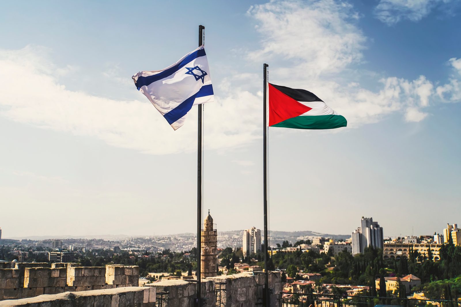 Flags,Of,Palestine,And,Israel,Against,Sky,And,Old,Jerusalem.