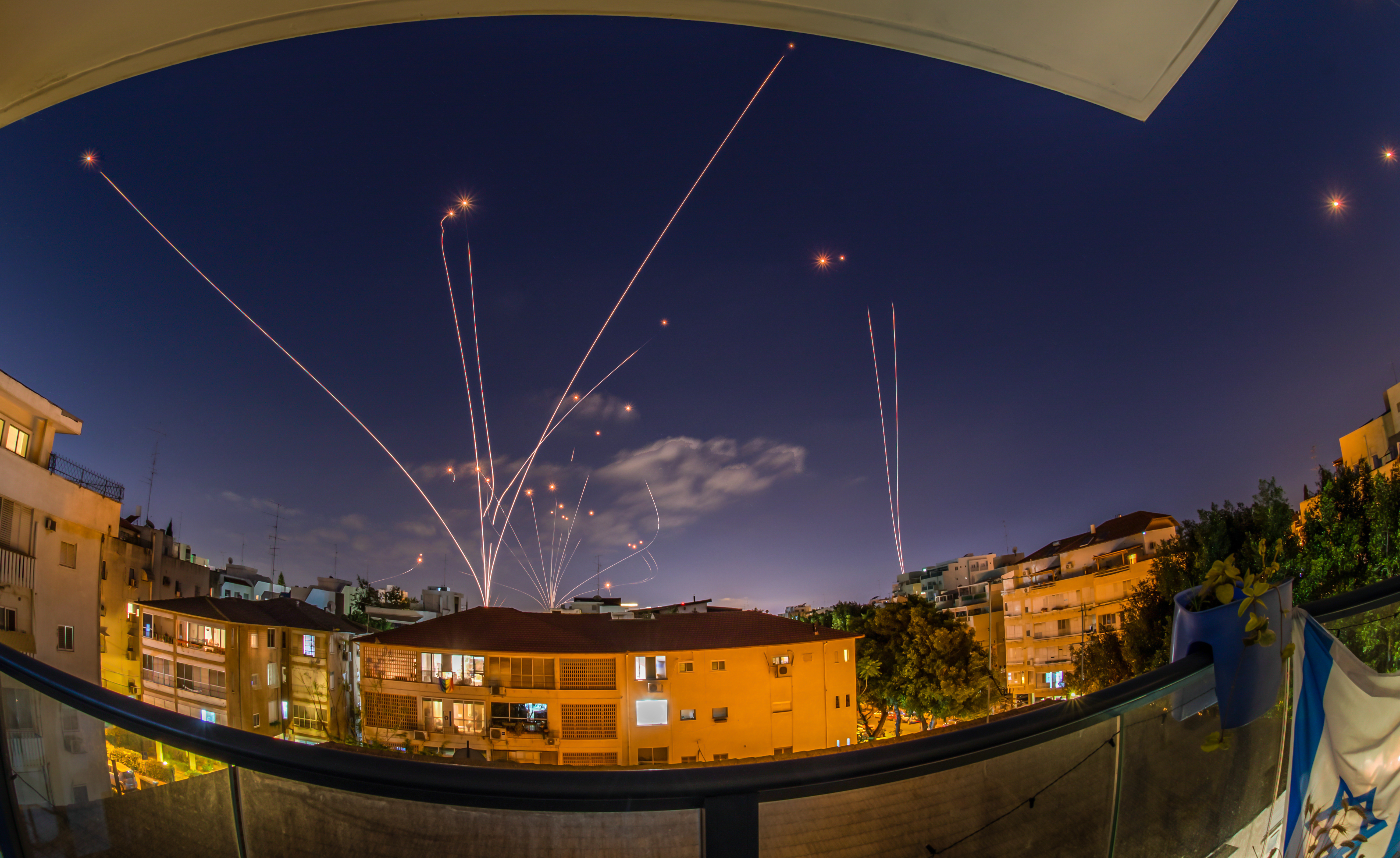 Iron Dome intercepting rockets during night attack over Ashdod, symbolizing Iran Israel conflict risk and escalation