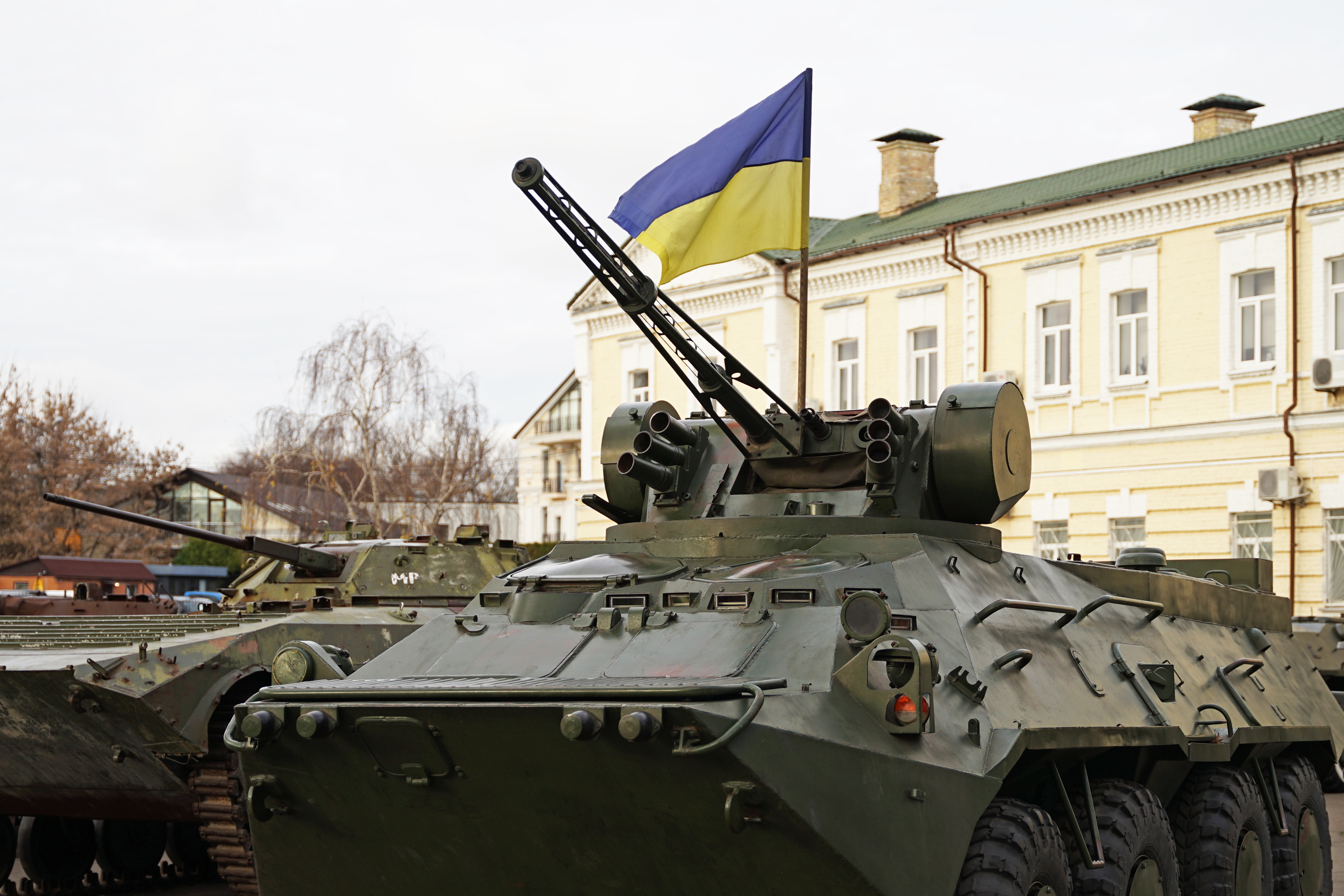 War in Ukraine Troop carrier tank Ukrainian flag Ukraine