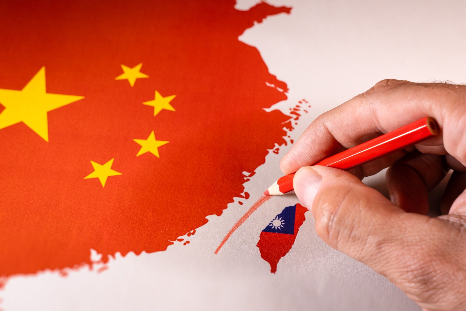 Hand,Drawing,A,Red,Line,Between,Taiwan,Isle,And,Mainland