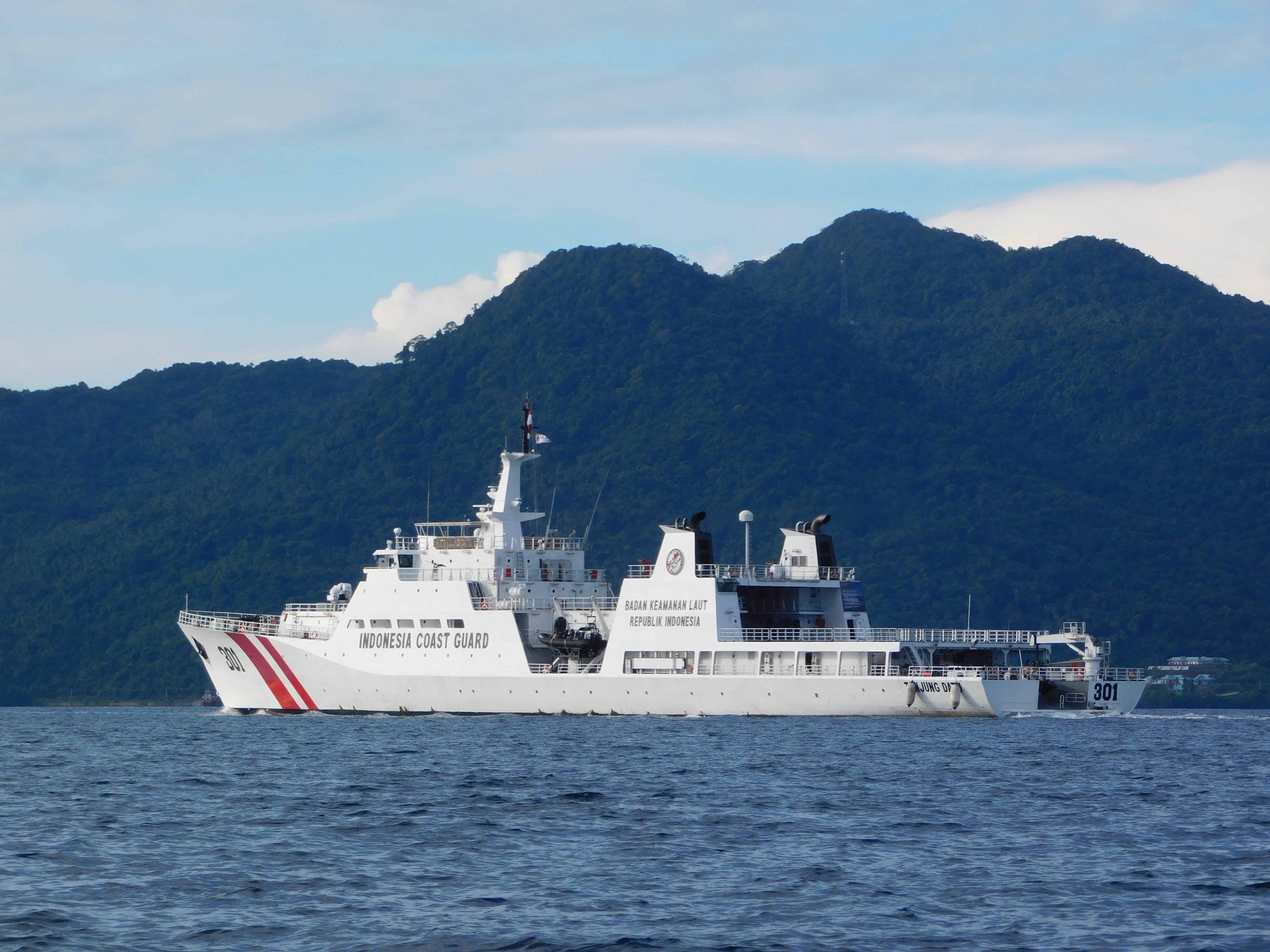 Start Natuna, Indonesia - June 15, 2024. Indonesian Coast Guard ships regularly patrol Natuna waters, as a form of the government's responsibility to protect Indonesian waters.