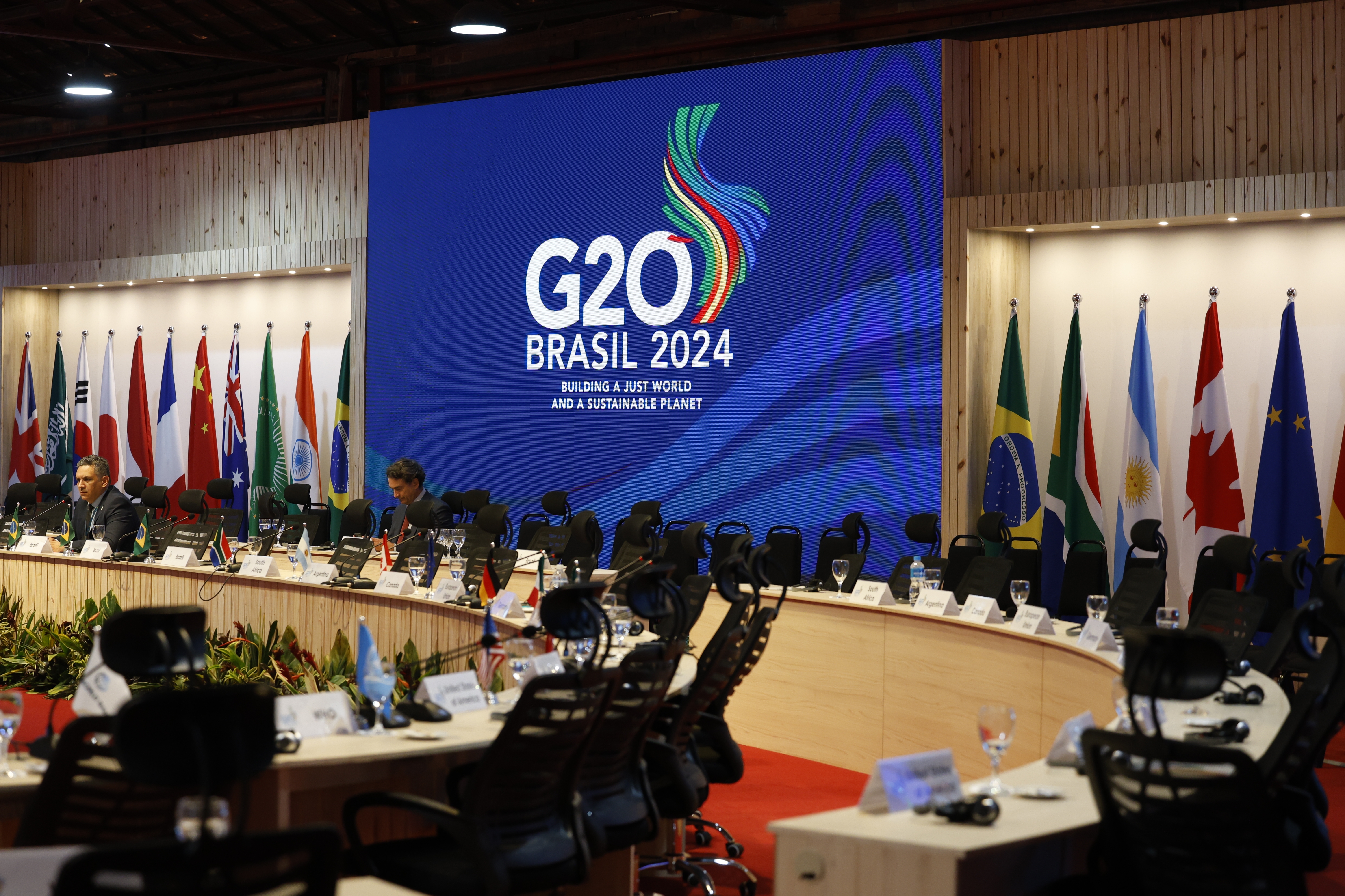 G20 Summit In Rio De Janeiro Brazil logo with flags and leaders gathered for global economic reform in Brazil