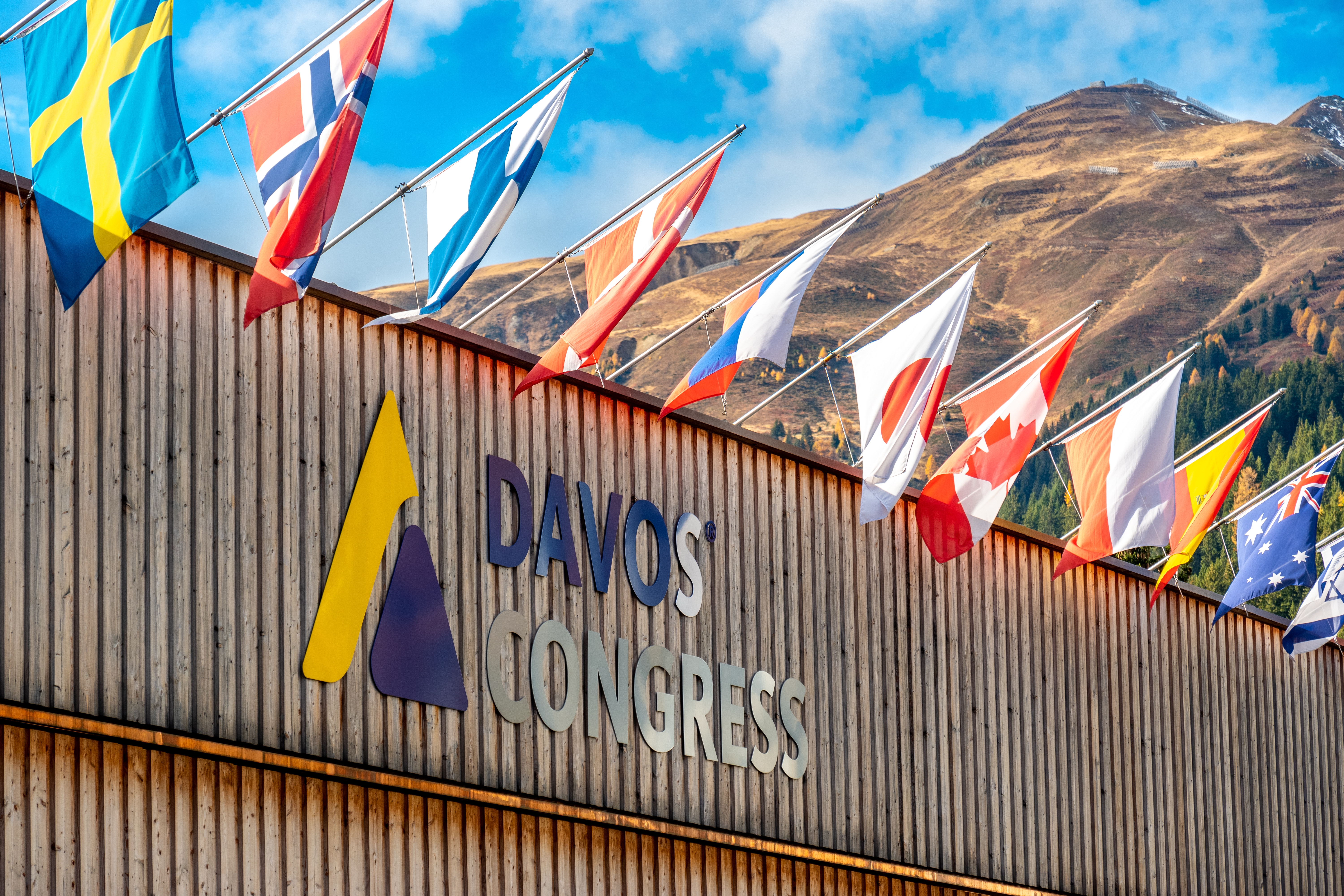 Davos 2025 As A Concentrated Expression Of Geopolitical Uncertainty Start DAVOS, SWITZERLAND - OCTOBER 31, 2021: Building of the Davos Congress Center, place of the world economic Forum wef