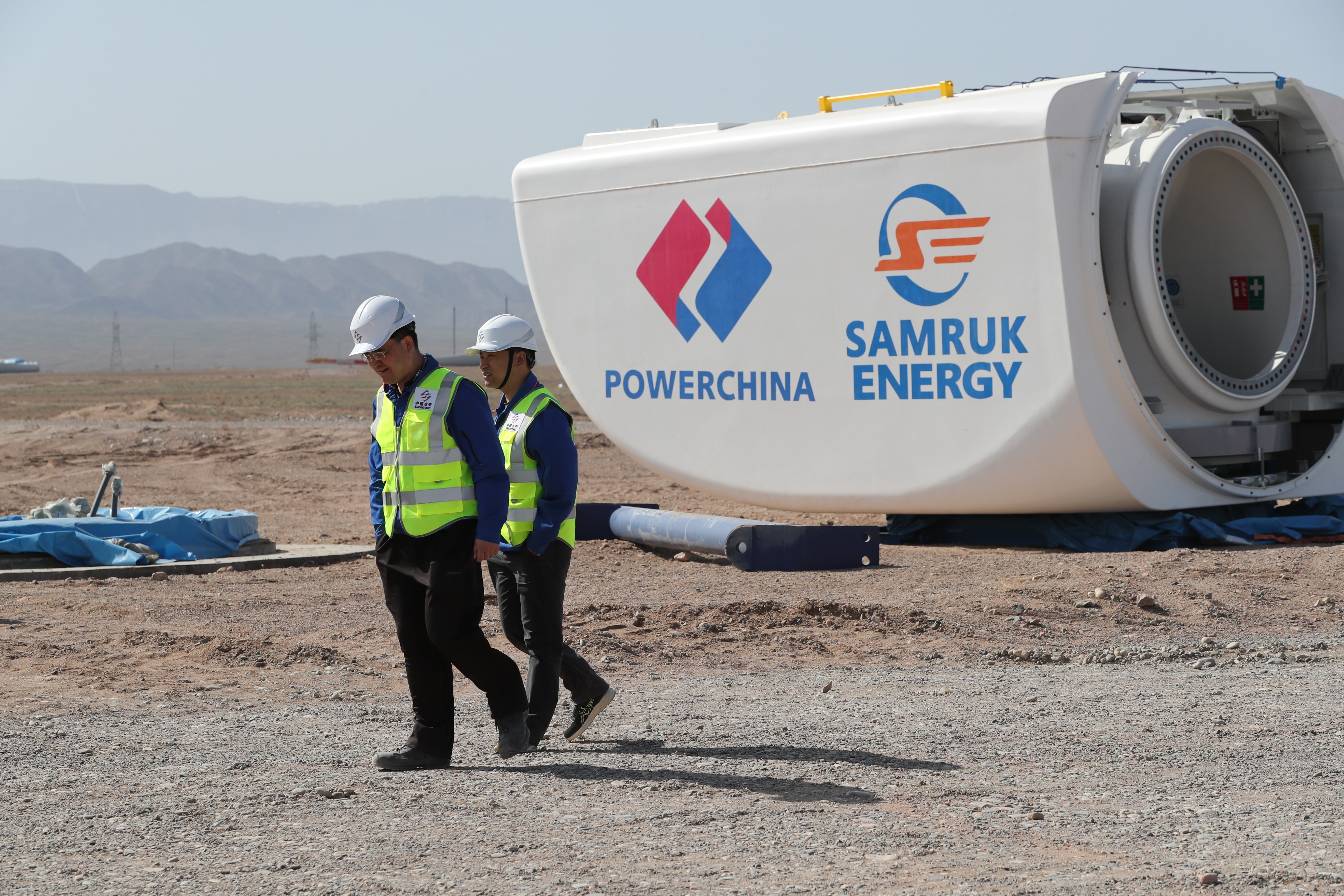 China Renewable Energy In Kazakhstan Start Workers install an electric power windmill during the construction of a wind farm by the Kazakh company Samruk-Energo in cooperation with China's PowerChina Corporation. Kazakhstan, April 7, 2022.