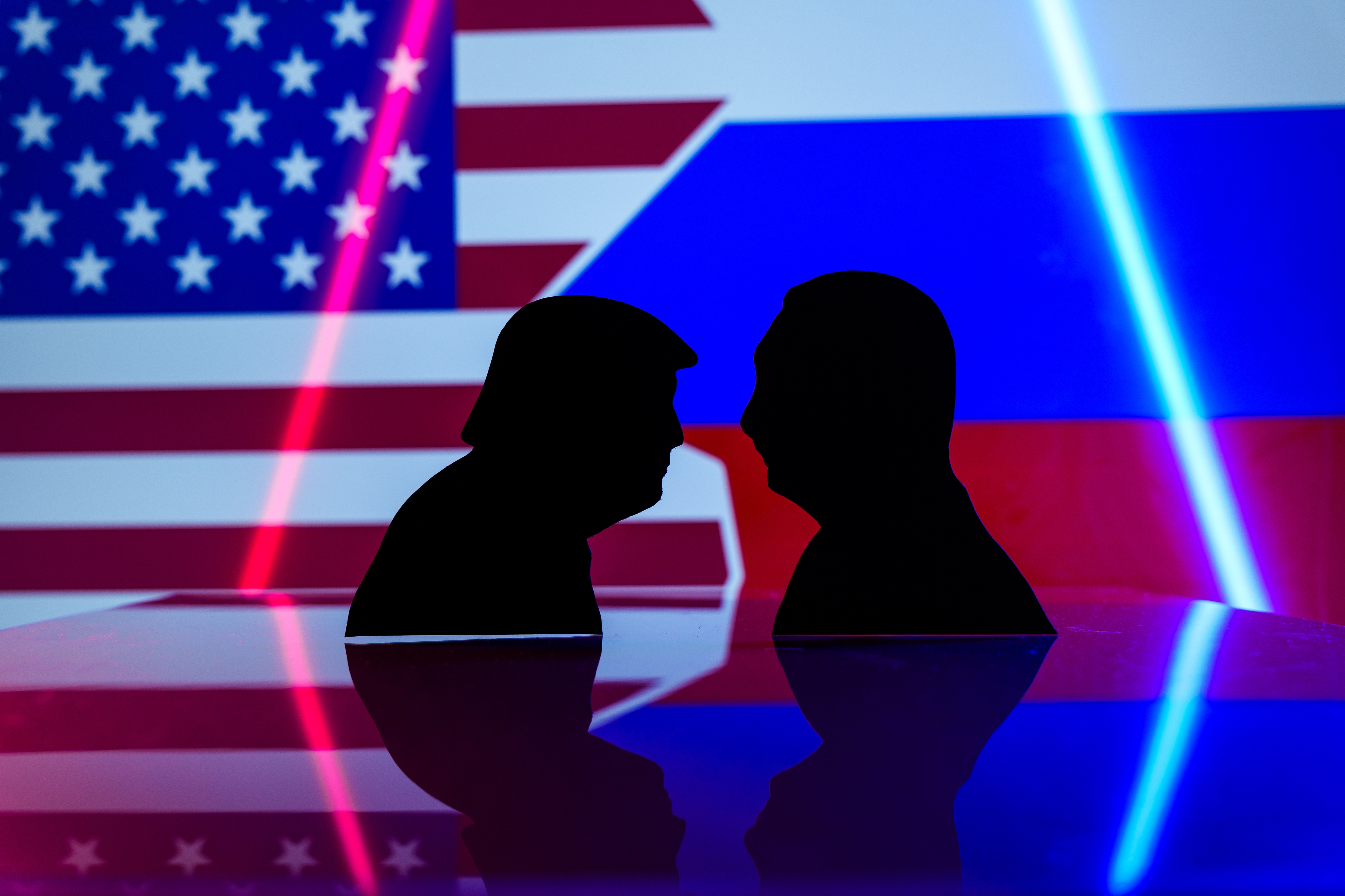 The World Awaits Change Start silhouettes of Donald Trump and Vladimir Putin in USA and Russian flags background. Washington DC, USA - November 11, 2024