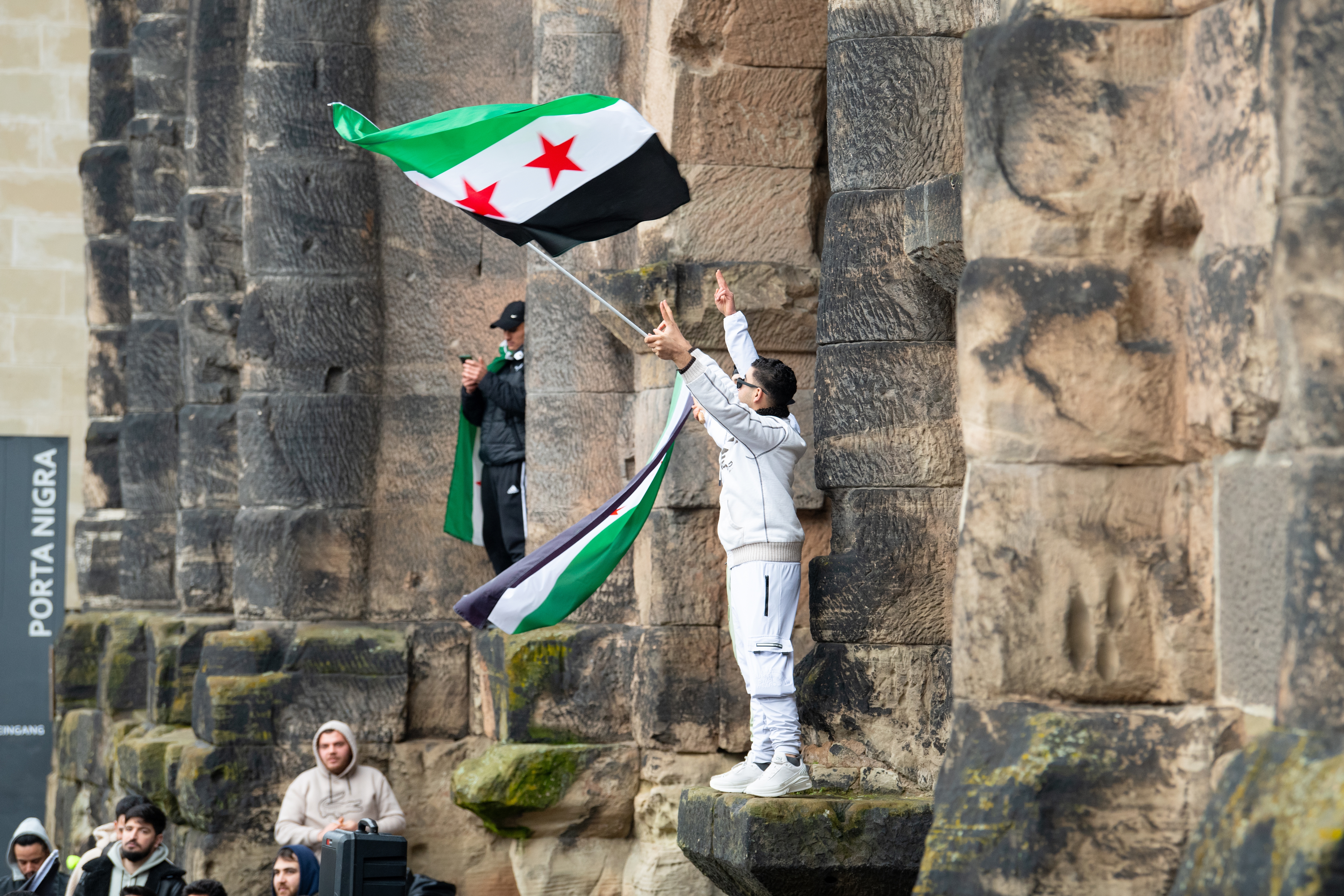 Syria unified state Syrians celebrate coup Porta Nigra Trier Germany 2024