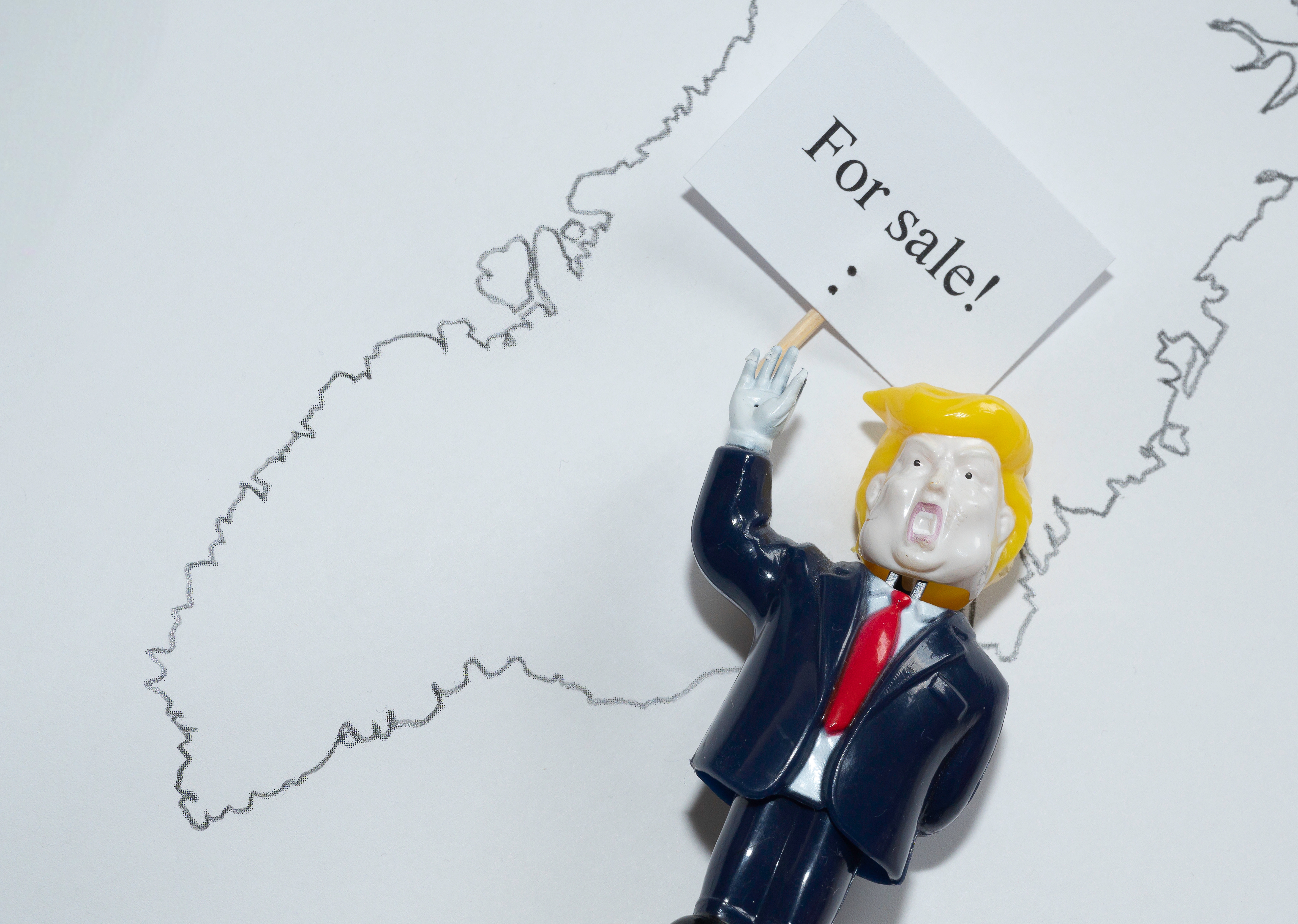 Reasons US Might Buy Greenland Start Greenland for sale? asks a Donald Trump doll, Denmark, January 10, 2025