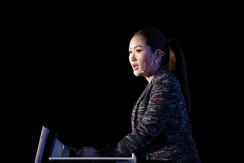 Thailand political crisis and diplomatic fallout shown by Paetongtarn Shinawatra addressing supporters at party assembly in Bangkok 2022