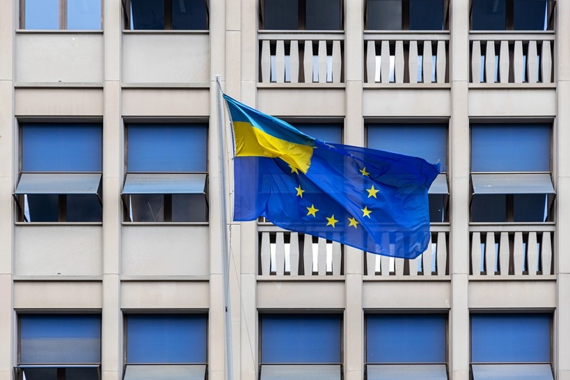ukraine european defence cooperation flags in front of modern building image
