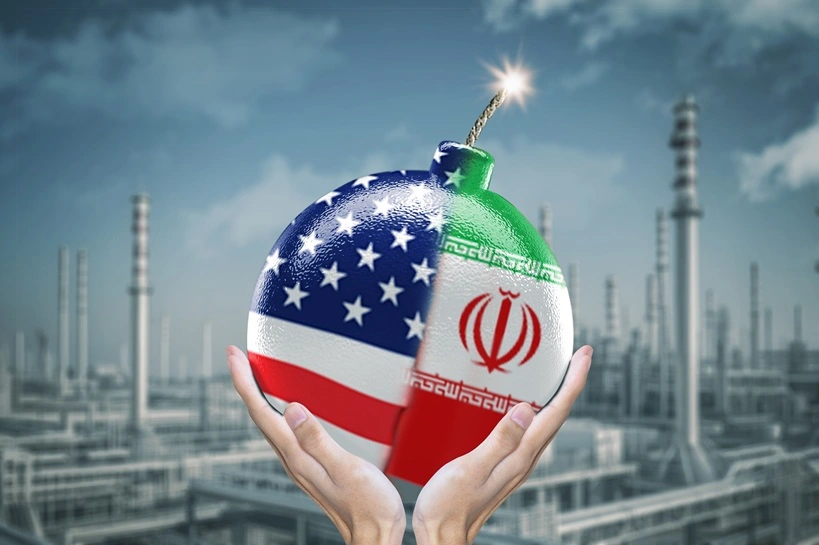 Geopolitical Tension Concept with USA and Iran Flag Bomb Over Oil Refinery