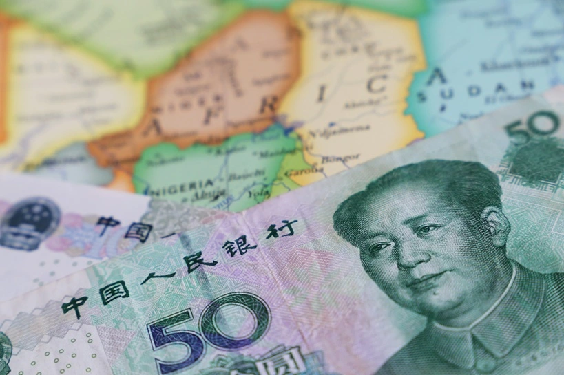 Yuan on the map of Africa. Chinese investment and trading, african economy, import and export