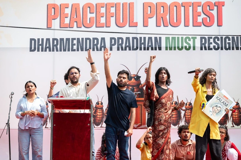 New Delhi, India- June 20 2026: Standing on the stage, Abhijeet Dipke, Founder of the Cockroach Janta Party (CJP), delivers a speech to supporters during a public demonstration. Participants raise their hands and chant slogans demanding examination transparency, education reforms, government accountability, and increased job opportunities for young people.Source: Shutterstock