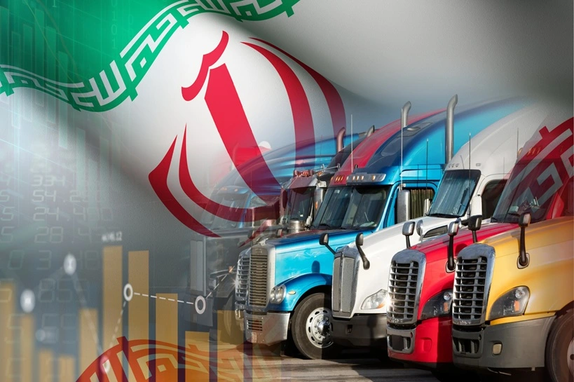 The Iranian road transport and logistics industry: The close link between goods circulation and economic development and fluctuations, illustrated with truck convoys and financial charts against the backdrop of the national flag. Source: Shutterstock