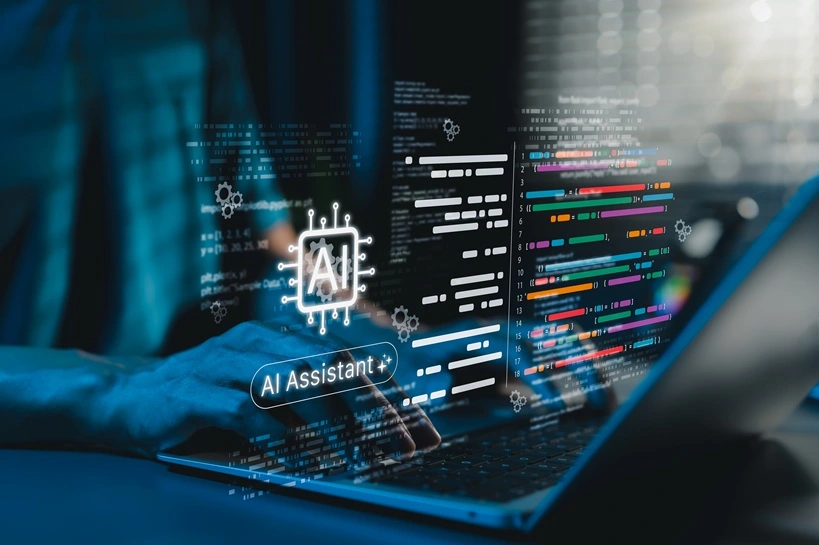 AI coding assistant for software development concept. Machine Learning Code, Programmer use laptop with code and AI chip represents artificial intelligence, AI programming, software development tools. Source: Shutterstock
