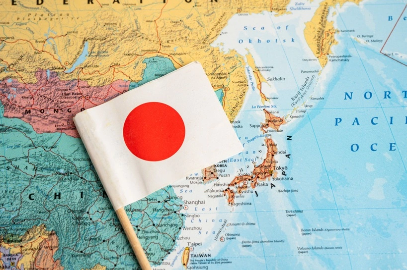 Bangkok, Thailand - February 1, 2022 Japan flag on world map background. Source: Shutterstock